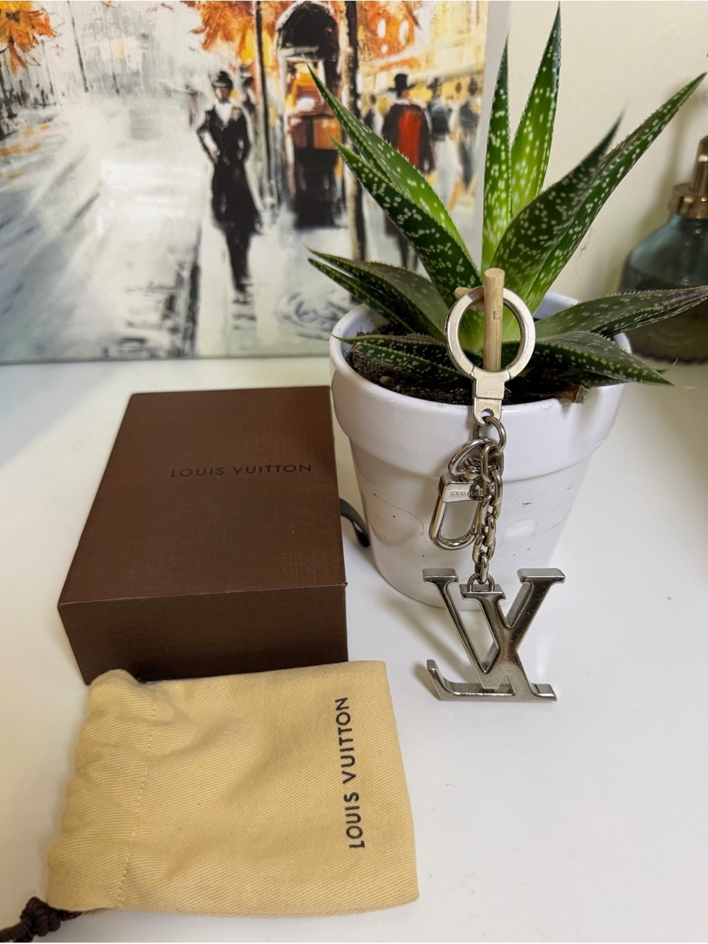 Louis Vuitton Silver-Tone LV Monogram Key Holder